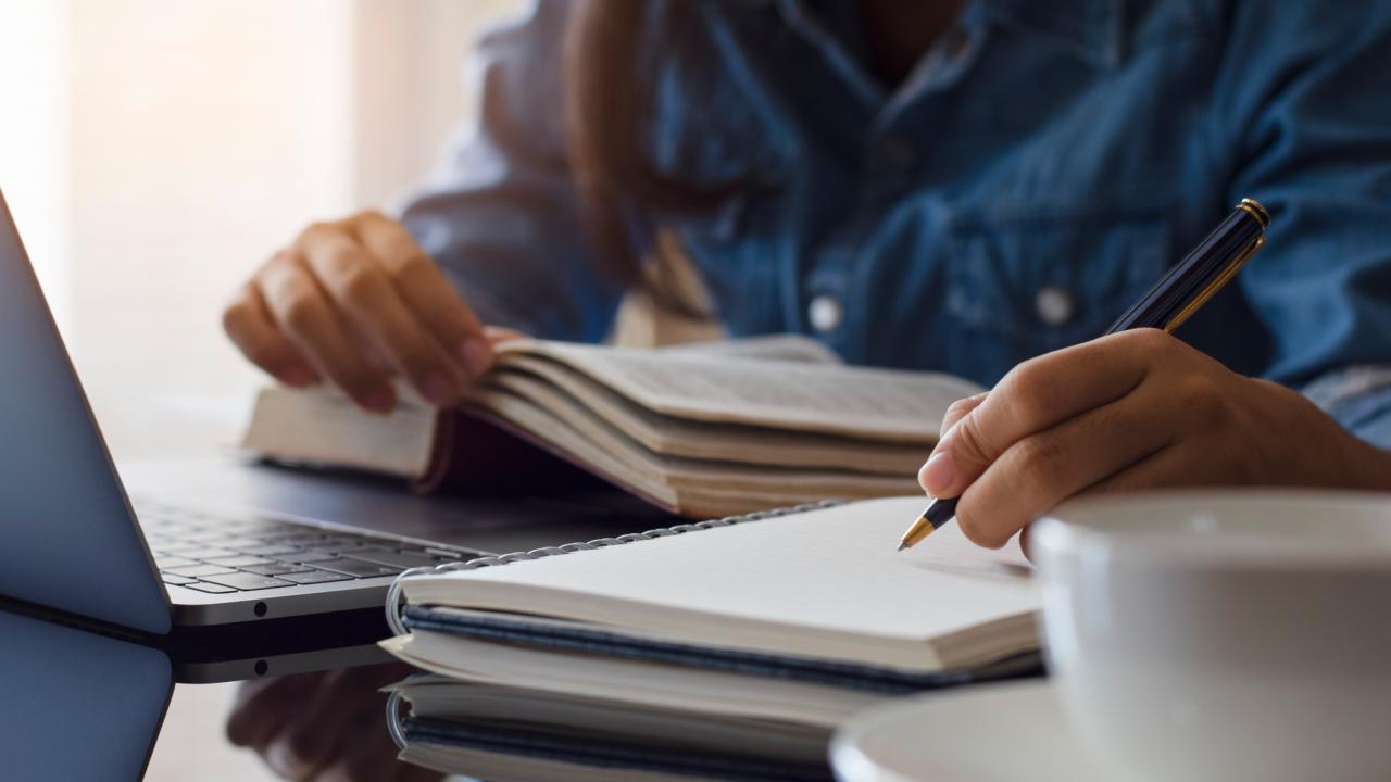 Person working with notebook